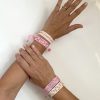 coppia di braccialetti ricamati