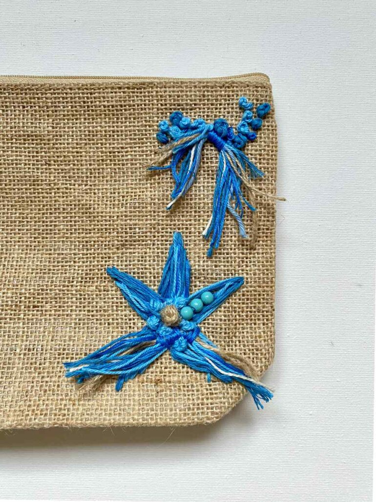 pochette stelle marine dettaglio ricamo