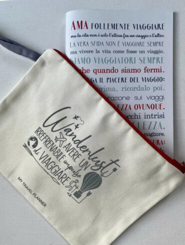 pochette Wanderlust e quaderno manifesto dei viaggiatori